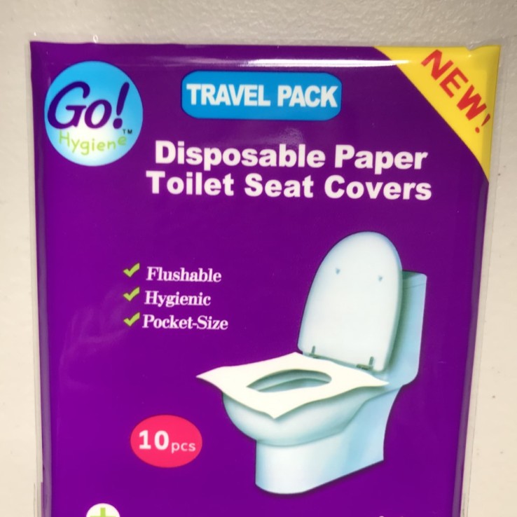 Disposable paper toilet seat covers