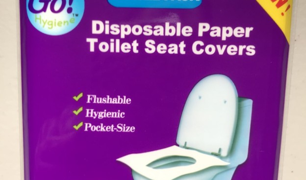 Disposable paper toilet seat covers